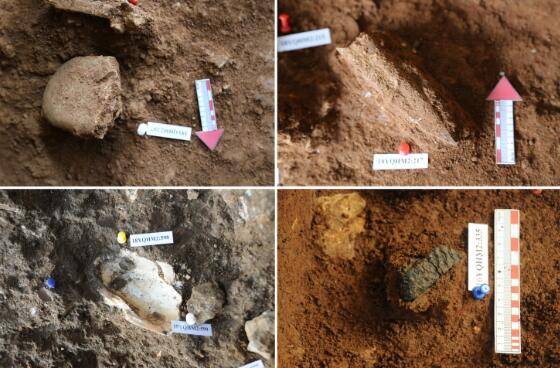 英德青塘遗址遗物出土现场（石器、骨器、蚌器、陶器）。